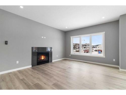 119 Livingston Close, Red Deer, AB - Indoor Photo Showing Living Room With Fireplace