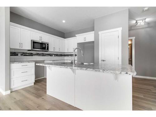 119 Livingston Close, Red Deer, AB - Indoor Photo Showing Kitchen With Upgraded Kitchen
