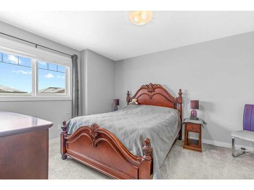 59 Iron Gate Boulevard, Sylvan Lake, AB - Indoor Photo Showing Bedroom