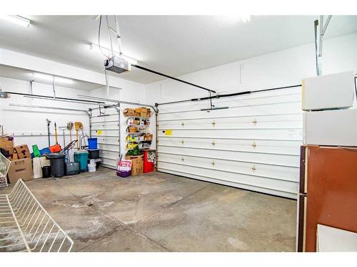 25 Ashmore Close, Red Deer, AB - Indoor Photo Showing Garage