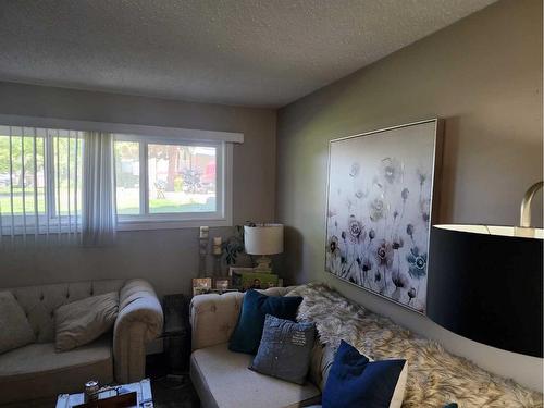 105-5812 61 Street, Red Deer, AB - Indoor Photo Showing Living Room