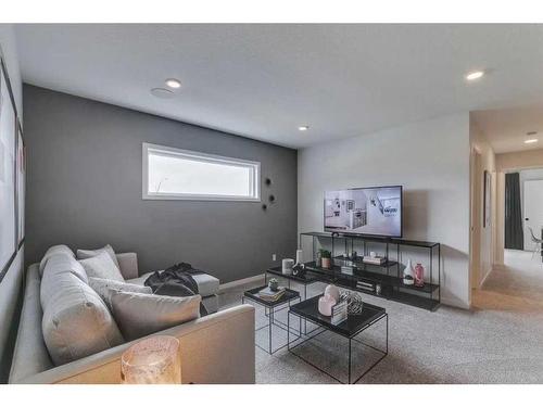 105 Creekstone Landing, Calgary, AB - Indoor Photo Showing Living Room