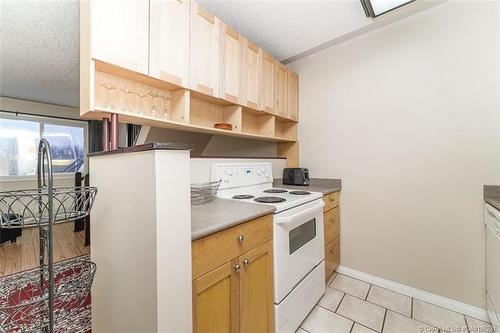 256-103 Hermary Street, Red Deer, AB - Indoor Photo Showing Kitchen