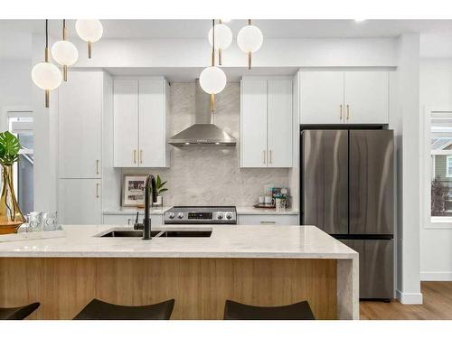 71-903 Mahogany Boulevard Se, Calgary, AB - Indoor Photo Showing Kitchen With Double Sink With Upgraded Kitchen