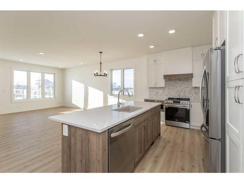 25 Tranter Street, Red Deer, AB - Indoor Photo Showing Kitchen With Stainless Steel Kitchen With Upgraded Kitchen