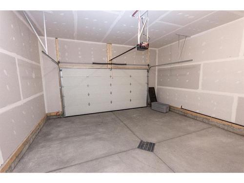17 Toal Close, Red Deer, AB - Indoor Photo Showing Garage