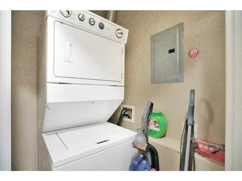 105-4707 50 Street, Sylvan Lake, AB - Indoor Photo Showing Laundry Room