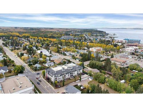 105-4707 50 Street, Sylvan Lake, AB - Outdoor With Body Of Water With View