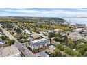 105-4707 50 Street, Sylvan Lake, AB  - Outdoor With Body Of Water With View 