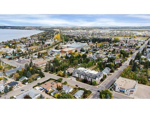 105-4707 50 Street, Sylvan Lake, AB - Outdoor With Body Of Water With View