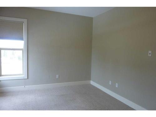 402-5901 71 Ave, Rocky Mountain House, AB - Indoor Photo Showing Other Room