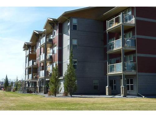 402-5901 71 Ave, Rocky Mountain House, AB - Outdoor With Balcony With Facade