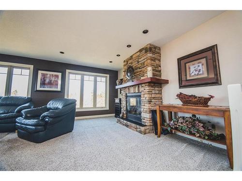 524 Summer Crescent, Rural Ponoka County, AB - Indoor Photo Showing Other Room With Fireplace