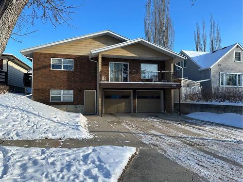 4709 51 Street, Camrose, AB - Outdoor With Balcony With Facade