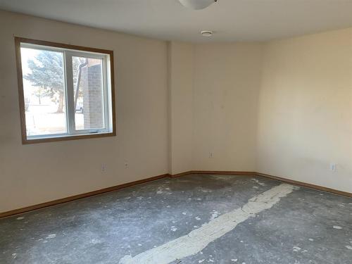 105-5205 Woodland Road, Innisfail, AB - Indoor Photo Showing Other Room