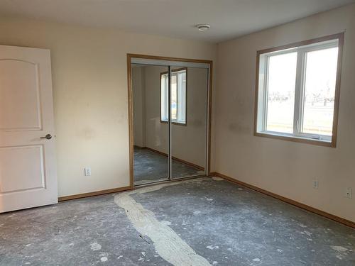 105-5205 Woodland Road, Innisfail, AB - Indoor Photo Showing Other Room