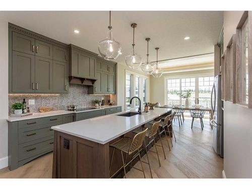 7 Songbird Green, Sylvan Lake, AB - Indoor Photo Showing Kitchen With Upgraded Kitchen