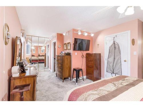 3 Rustic Road, Norglenwold, AB - Indoor Photo Showing Bedroom