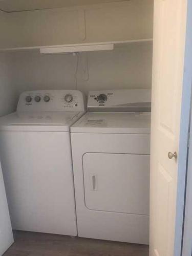 9-5034 53 Street, Lacombe, AB - Indoor Photo Showing Laundry Room