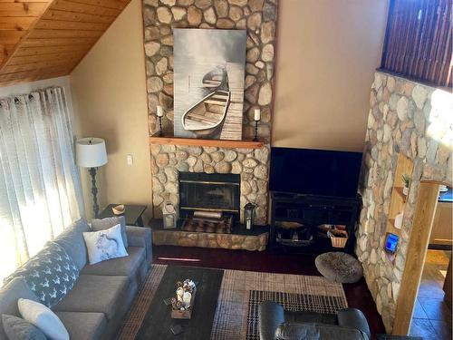40303 Rr222, Rural Lacombe County, AB - Indoor Photo Showing Living Room With Fireplace