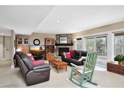 405 Birchcliff Road, Birchcliff, AB - Indoor Photo Showing Living Room With Fireplace
