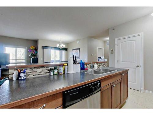 303-3615 51 Avenue, Red Deer, AB - Indoor Photo Showing Kitchen With Double Sink
