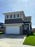 362 Rivercrest Road, Cochrane, AB  - Outdoor With Facade 