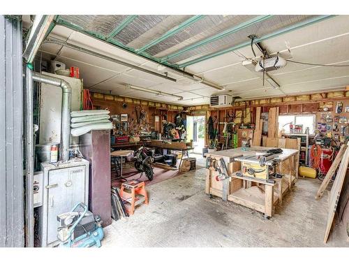 1156 Highway 11A, Sylvan Lake, AB - Indoor Photo Showing Garage