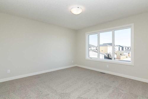 172 Emberside Hollow, Cochrane, AB - Indoor Photo Showing Other Room