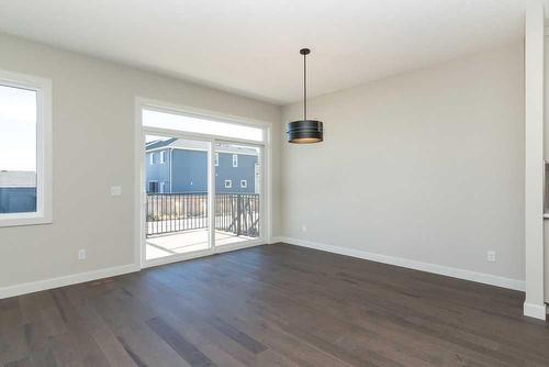 172 Emberside Hollow, Cochrane, AB - Indoor Photo Showing Other Room