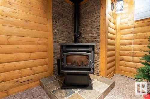 473061 A Rr 243A, Millet, AB - Indoor With Fireplace