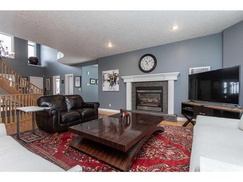51146 Ab 21, Rural Strathcona County, AB - Indoor Photo Showing Living Room With Fireplace