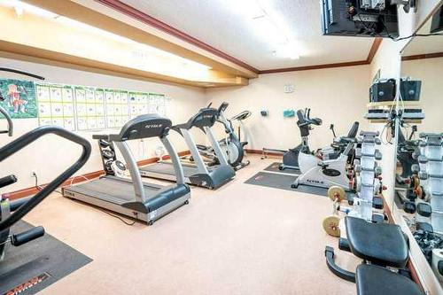 120-5300 48 Street, Red Deer, AB - Indoor Photo Showing Gym Room