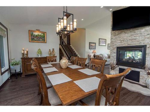 36141 Range Road 280, Rural Red Deer County, AB - Indoor Photo Showing Dining Room With Fireplace