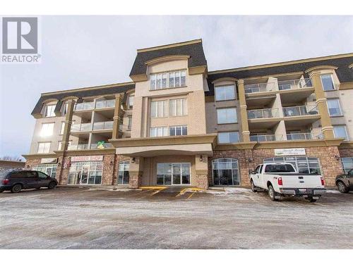 308-4425 Heritage Way, Lacombe, AB - Outdoor With Facade