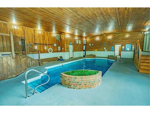 321-5120 62 Street, Red Deer, AB - Indoor Photo Showing Other Room With In Ground Pool