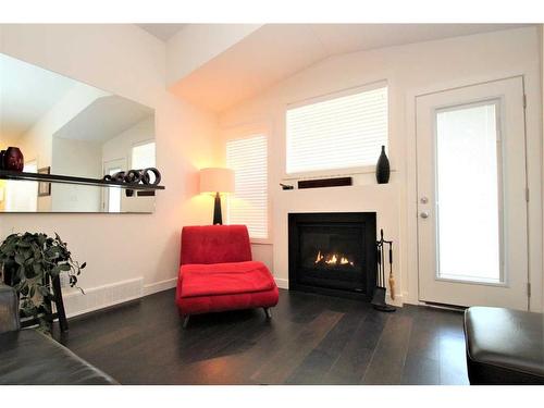 33 Golden Crescent, Red Deer, AB - Indoor Photo Showing Living Room With Fireplace