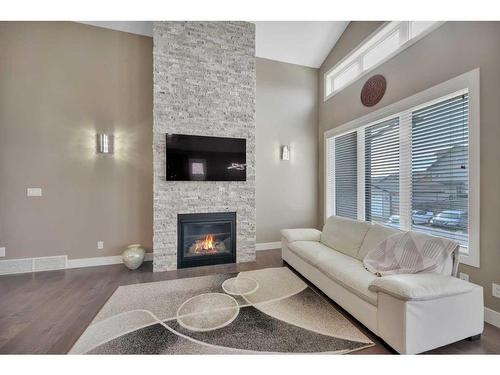 77 Turner Crescent, Red Deer, AB - Indoor Photo Showing Living Room With Fireplace
