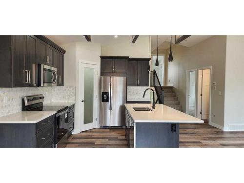 4761 Aspen Lakes Boulevard, Blackfalds, AB - Indoor Photo Showing Kitchen With Stainless Steel Kitchen With Double Sink With Upgraded Kitchen