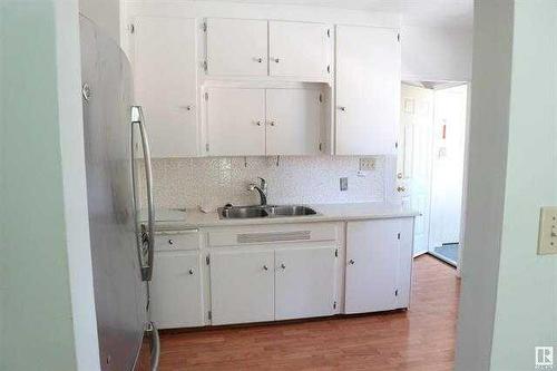 A50066 Rr15, Thorsby, AB - Indoor Photo Showing Kitchen With Double Sink