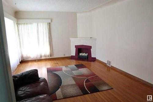 A50066 Rr15, Thorsby, AB - Indoor Photo Showing Living Room With Fireplace