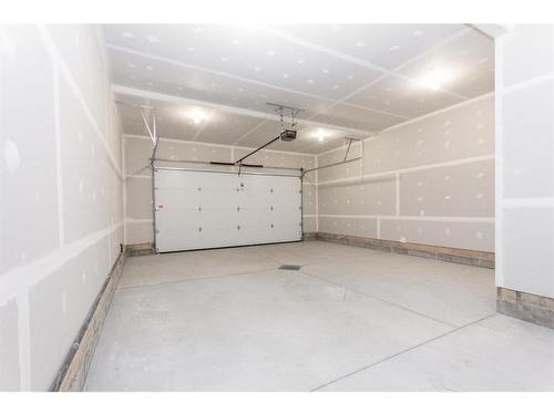 153 Thompson Crescent, Red Deer, AB - Indoor Photo Showing Garage