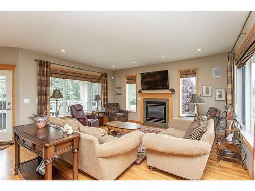 6765 40 Avenue, Red Deer, AB - Indoor Photo Showing Living Room With Fireplace
