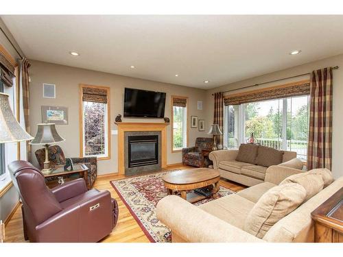 6765 40 Avenue, Red Deer, AB - Indoor Photo Showing Living Room With Fireplace