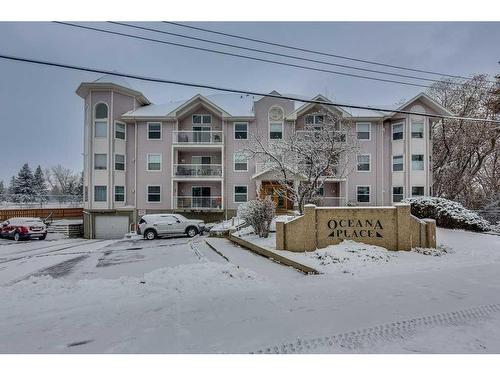 304-5435 Lakeshore Drive, Sylvan Lake, AB - Outdoor With Balcony With Facade