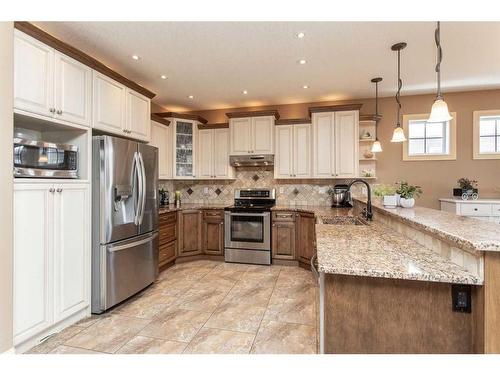 64 Cyprus Road, Blackfalds, AB - Indoor Photo Showing Kitchen With Stainless Steel Kitchen With Upgraded Kitchen