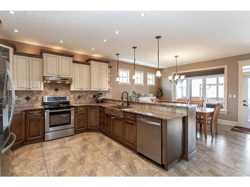 64 Cyprus Road, Blackfalds, AB - Indoor Photo Showing Kitchen With Stainless Steel Kitchen With Upgraded Kitchen