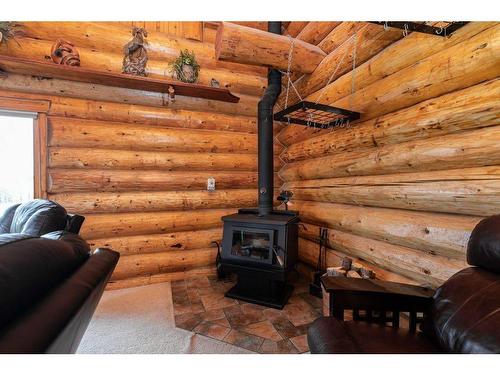 373028 7-1  Range Road, Rural Clearwater County, AB - Indoor With Fireplace