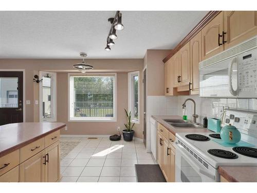 37549 781 Highway, Rural Red Deer County, AB - Indoor Photo Showing Kitchen With Double Sink