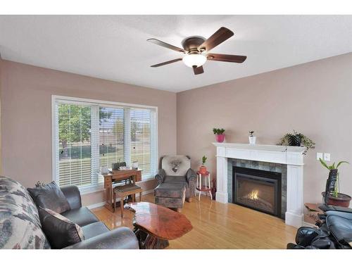37549 781 Highway, Rural Red Deer County, AB - Indoor Photo Showing Living Room With Fireplace